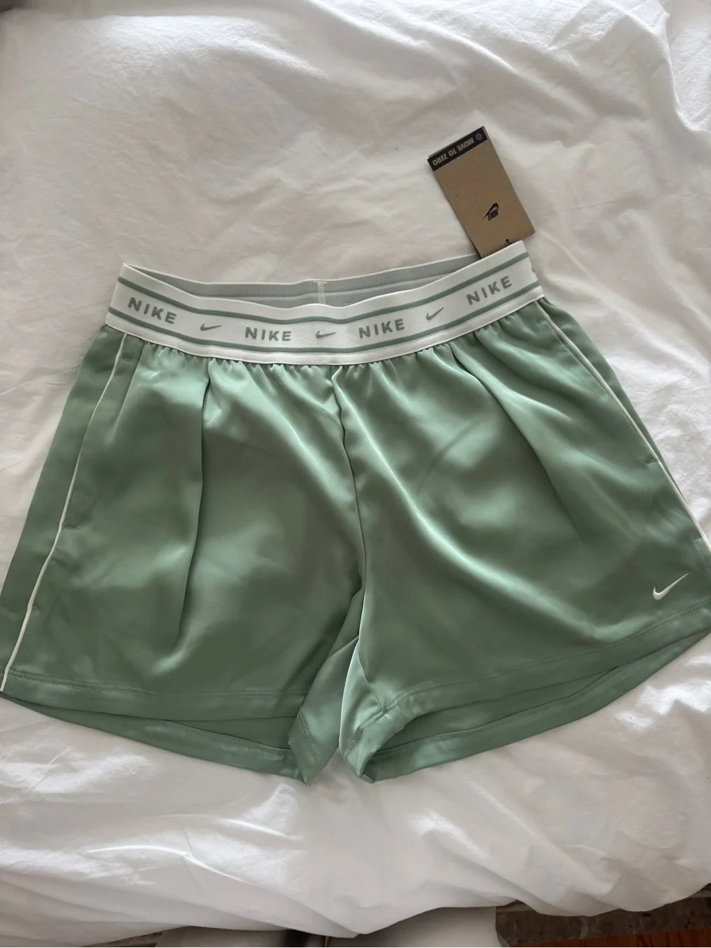 Nike Women's Sage Green Athletic Shorts with White Logo Waistband